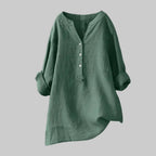 Green shirt with rolled-up sleeves on a white background