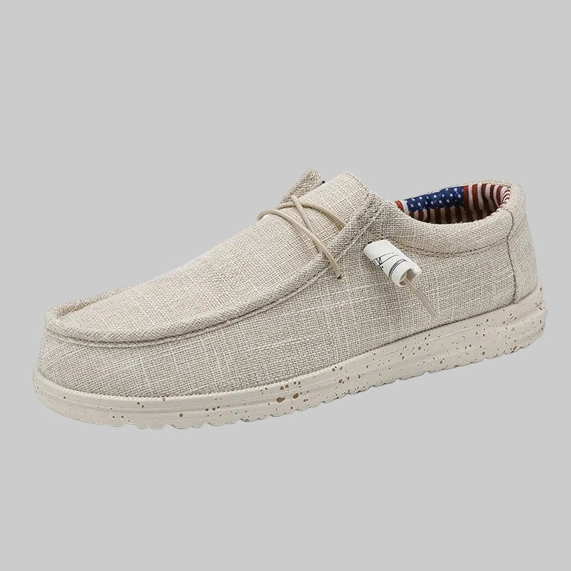 Beige casual shoe on a white background