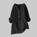 Black blouse with rolled-up sleeves on a white background