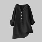 Black blouse with rolled-up sleeves on a white background