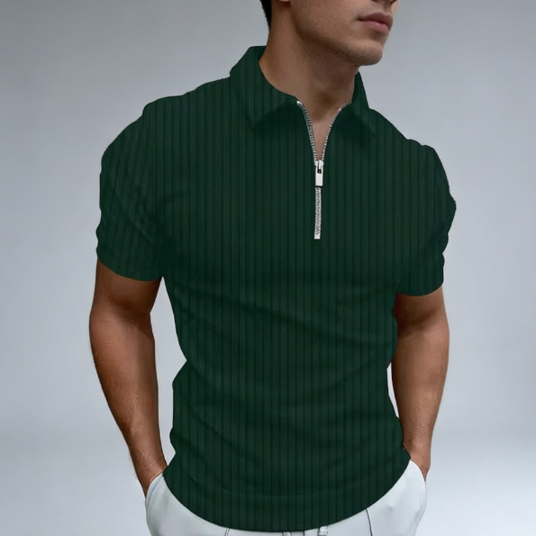 Man wearing a green polo shirt with a zipper 